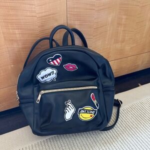 Faux leather mini backpack with patches